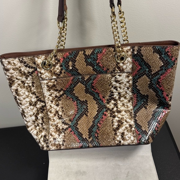 Calvin Klein Hayden Snake Tote
NWOT - Picture 7 of 13